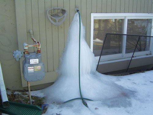 A column of ice formed under a connected garden hose